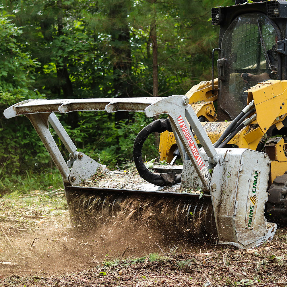 forestry mulching machine in action clearing overgrown land in Shreveport LA